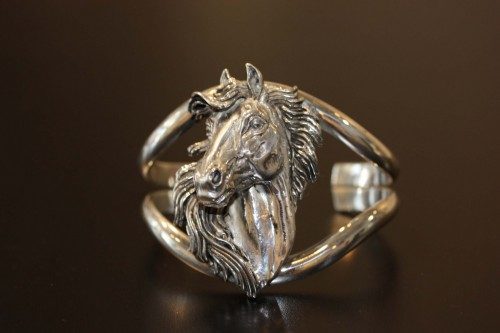 Horse Head Cuff Bracelet — The popular cuff bracelet which can include accents of 14 ct gold and/or meticulously placed diamonds within this smart and gallant equine depiction.