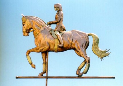 "Dressage - Passage Horse with Rider Weathervane" We have made this passage horse weathervane with and without a rider.  If you look closely you will see that the leg positions, manes and tails on the three horses are all slightly different.  Because each weathervane is made to order, we are often able to accommodate customer's requests for additional personalization.    Both Passage Horse weathervane with riders shown here are portrait weathervanes.  Our customers sent us photos and we worked with them to create one-of-a-kind weathervanes. As you can see, age, hairstyles, attire and even the horse’s markings can vary from weathervane to weathervane. While both of these weathervanes happen to represent women riders, we can certainly make this weathervane with male riders as well. We do charge a fee to personalize the weathervanes. The fee varies depending on the extent of the modifications. If you have something in mind, please give us a call and we would be happy to discuss it with you.