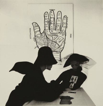 Irving Penn "The Tarot Reader" (Bridget Tichenor and Jean Patchett) New York, 1949, Selenium toned gelatin silver print, printed 1984, 18.5 x 19 inches (47 x 48.3 cm) Signed, titled, dated in ink and Condé Nast copyright credit reproduction limitation stamp on the verso. One from an edition of 26.