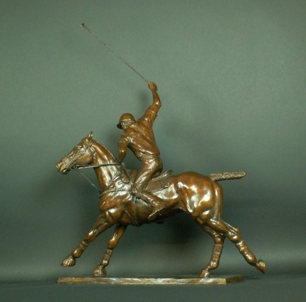 Gill Parker, British Contemporary "Polo XII: Offside Forehand" Bronze, Edition 1 of 9, Mid-brown patination, 31 x 25 inches, Signed and Numbered. Two views of this sculpture depicting a darker patina and another, lighter and more golden in colour are available.