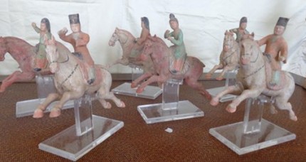 This set of six polo players is from the Tang Dynasty, c. 618-907 AD. The players each measure about 7" high, and the horses are about 9" long. They were purchased at the Antique Center in Bath, England in 1984. There is polychrome remaining on all of them and they are in excellent condition.
