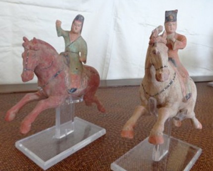 This set of six polo players is from the Tang Dynasty, c. 618-907 AD. The players each measure about 7" high, and the horses are about 9" long. They were purchased at the Antique Center in Bath, England in 1984. There is polychrome remaining on all of them and they are in excellent condition.