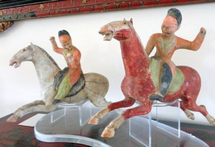 This set of two polo players is from the Tang Dynasty, c. 618-907 AD. The players each measure about 8 ½" high, and the horses are about 12" long. There is original polychrome remaining and they are both in excellent condition. They come with Thermoluminescence Reports from Oxford dated in 2002.