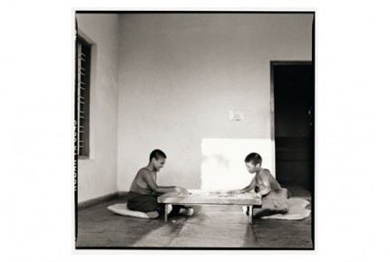 "Two monks playing carrom on a Monday" Gelatin silver print, Edition of 25, Paper size: 50 x 60 cms, Also available in 40 x 50 cms & 76 x 100 cms