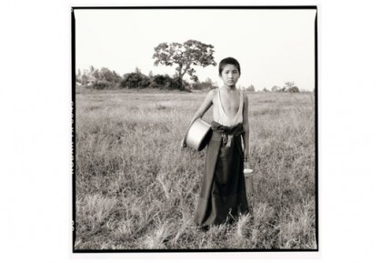 "Young Rato monk delivering milk" Gelatin silver print, Edition of 25, Paper size: 50 x 60 cms, Also available in 40 x 50 cms & 76 x 100 cms