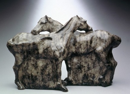 “Rendez-Vous” Bronze, Edition of 12, 15 x 21 x 7 inches, Signed & Numbered. Horses silhouetted in the fields are all I ever really see of their detail. How beautiful when they groom each other and become a large whole. Stolid in their simplicity and nuturing, they become a classical stone carving.