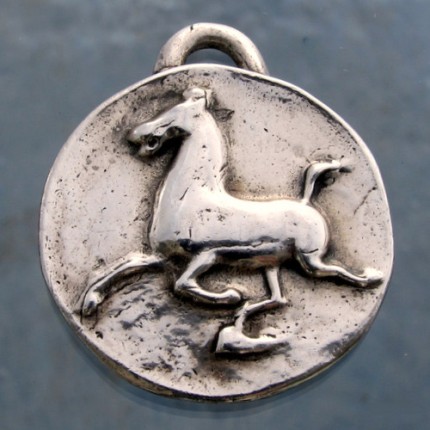 “Han Flying Horse” 1.25" Diameter, Price: $199, Chisholm Ref. #: F-EA5 | Large silver piece featuring the classic image of the Han Dynasty Flying Horse. This makes a dramatic necklace when paired with a rolo chain and worn in front with a toggle clasp.