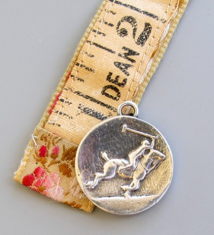 “Polo Charge” 7/8" Diameter, Price: $179, Chisholm Ref. #: S-SH4 | Here a polo player and pony act as one in pursuit of the ball. This piece captures the magic that happens when the border between horse and rider seems to disappear. Hand crafted in .960 silver.