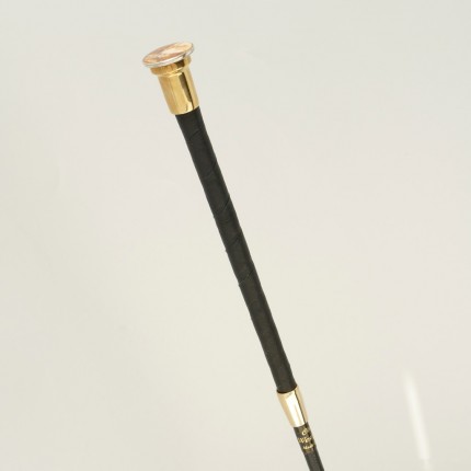 “Sidesaddle Dressage Whip” Sidesaddle Dressage Whip, Price: $135, Chisholm Ref. #: EWW1 - This is the Sidesaddle Dressage Whip, made in collaboration with the venerable Westfield Whip Manufacturing Co. It is leather wrapped with a brass cap and ferrule. It is finely balanced and fairly stiff. The embellishment is a paper image under an epoxy resin cap.