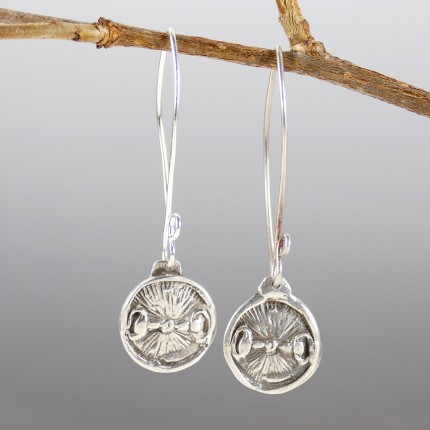 “Snaffle Bit Earrings” Overall length: 2", Price: $149, Chisholm Ref. #: SE6 - Snaffle bits are the motif in these round earring on long ear wires. Earrings are hand crafted in .960 silver. Ear wires are sterling silver (.925).