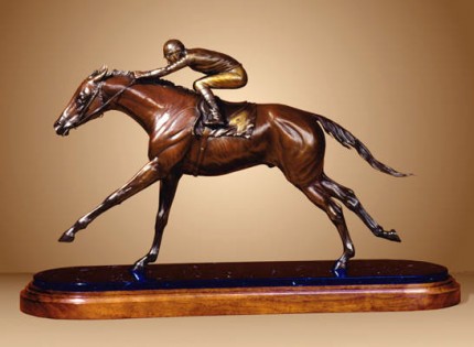 “Glimpse of Glory” 1/5 Life-Size Master Model for Proposed Life-Size, Bronze, 20 x 32.5 x 10 inches (50.8 x 82.55 x 25.4 cm) Collector's Limited Edition of 15 | Hearts pounding, hooves flying — Man and horse are as one as they near the finish line!   